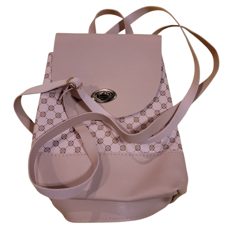 small pink purse with a gold-toned twist lock closure